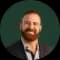 Portrait of Bennett Andrews, author of this cash home buying guide